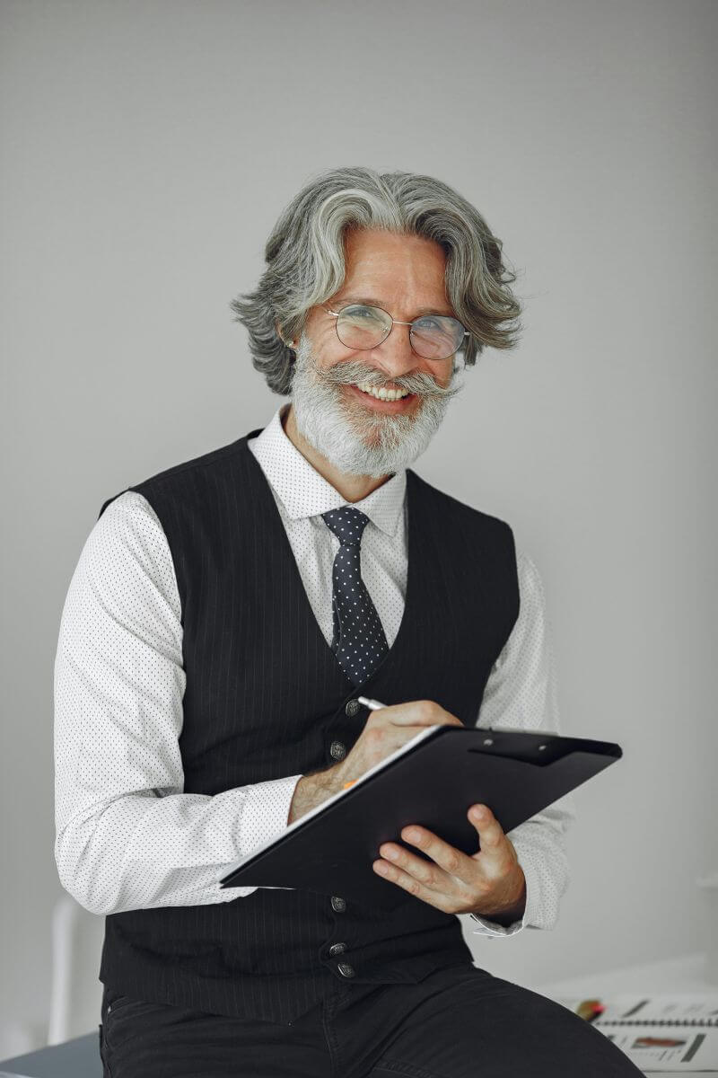 Image: A busy professional who appears calm and focused, or someone balancing multiple responsibilities with grace.